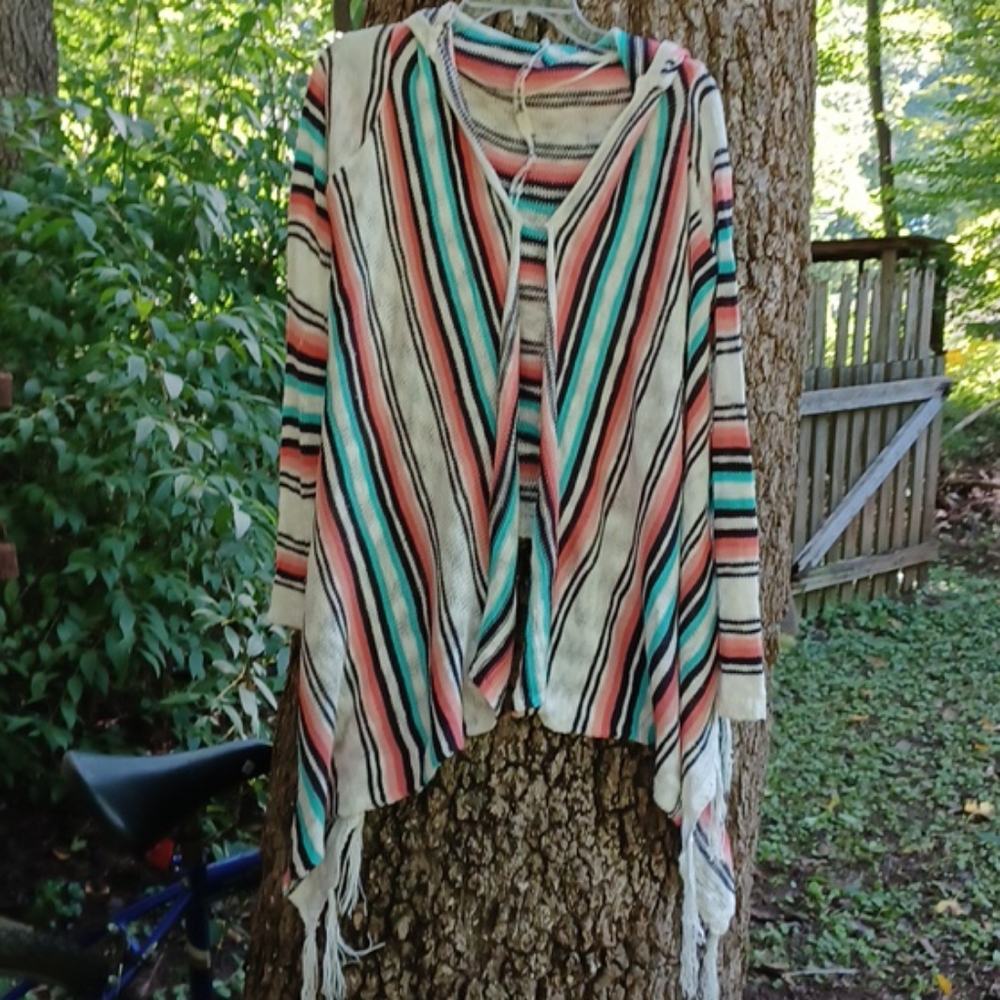 Boho fringe hooded sweater.